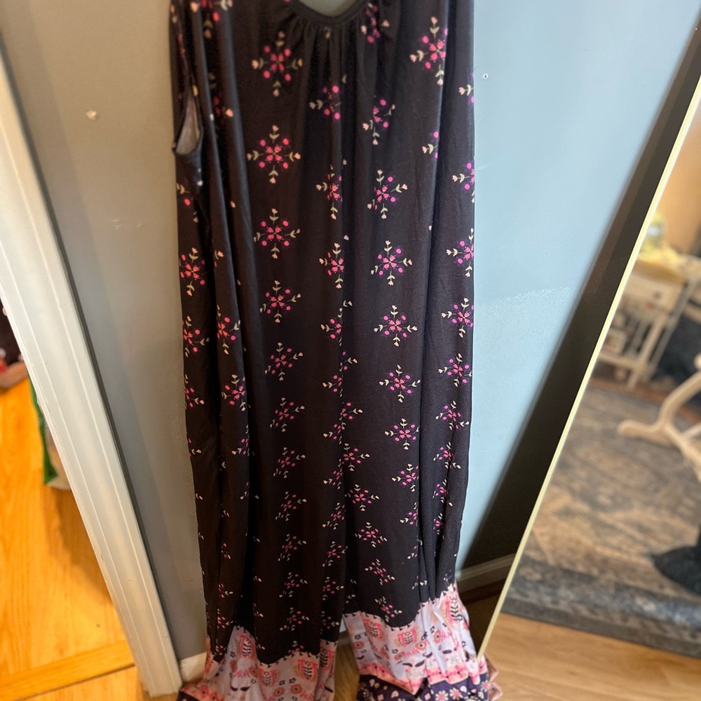 Elegant Black Jumpsuit with Pink Floral Pattern